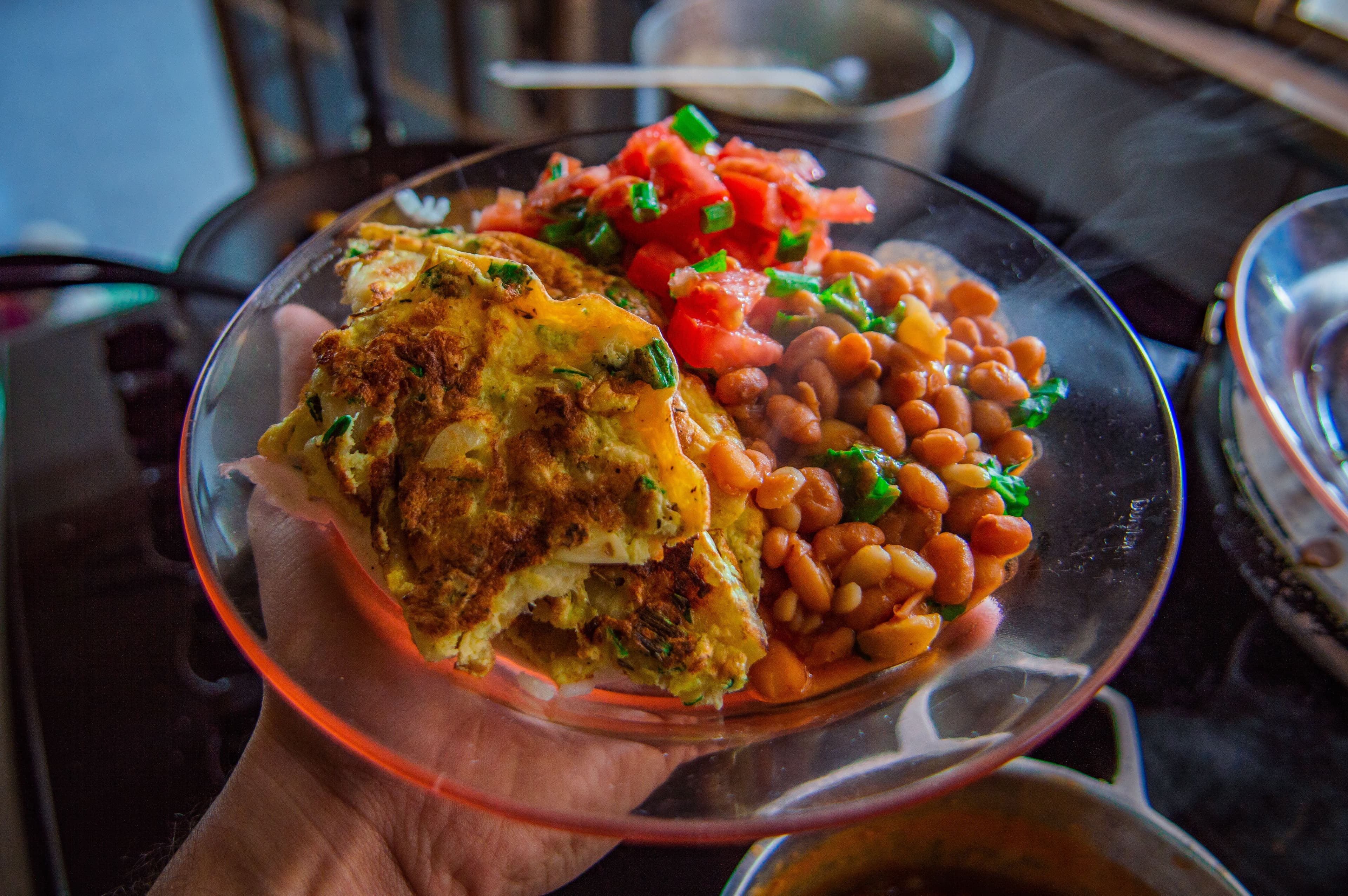 A private chef plating an elegant continental dish.
